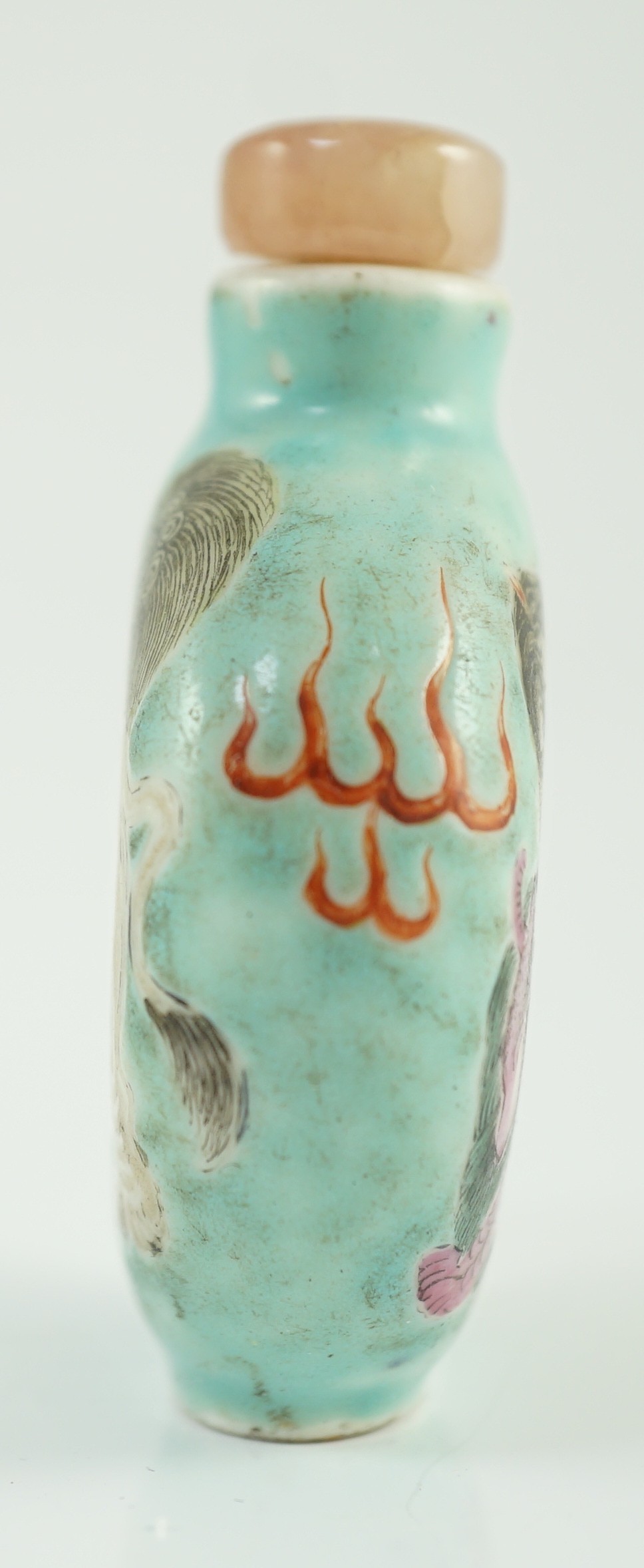 A Chinese enamelled porcelain ‘mythical beasts’ snuff bottle, 1850-1900, 5.6cm, splinter chips to foot